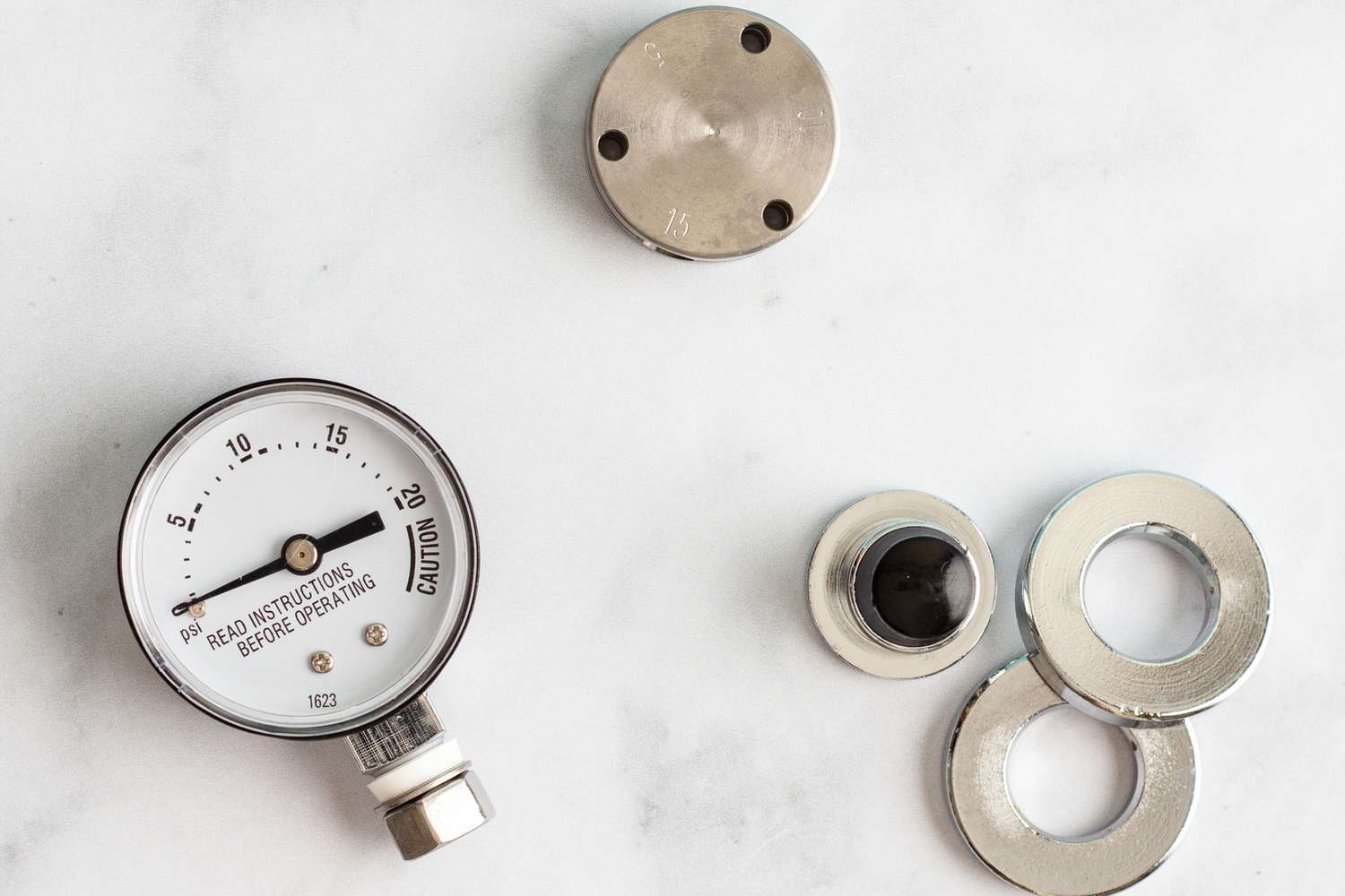 A few different types of gauges for pressure canners.