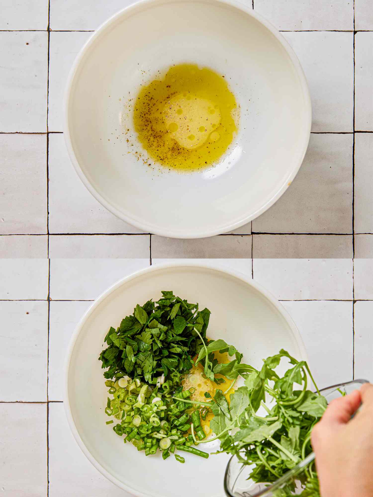 Two bowls one with dressing prepared and the other being filled with herbs and greens