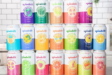 A variety of Spindrift sparkling water cans arranged in a grid