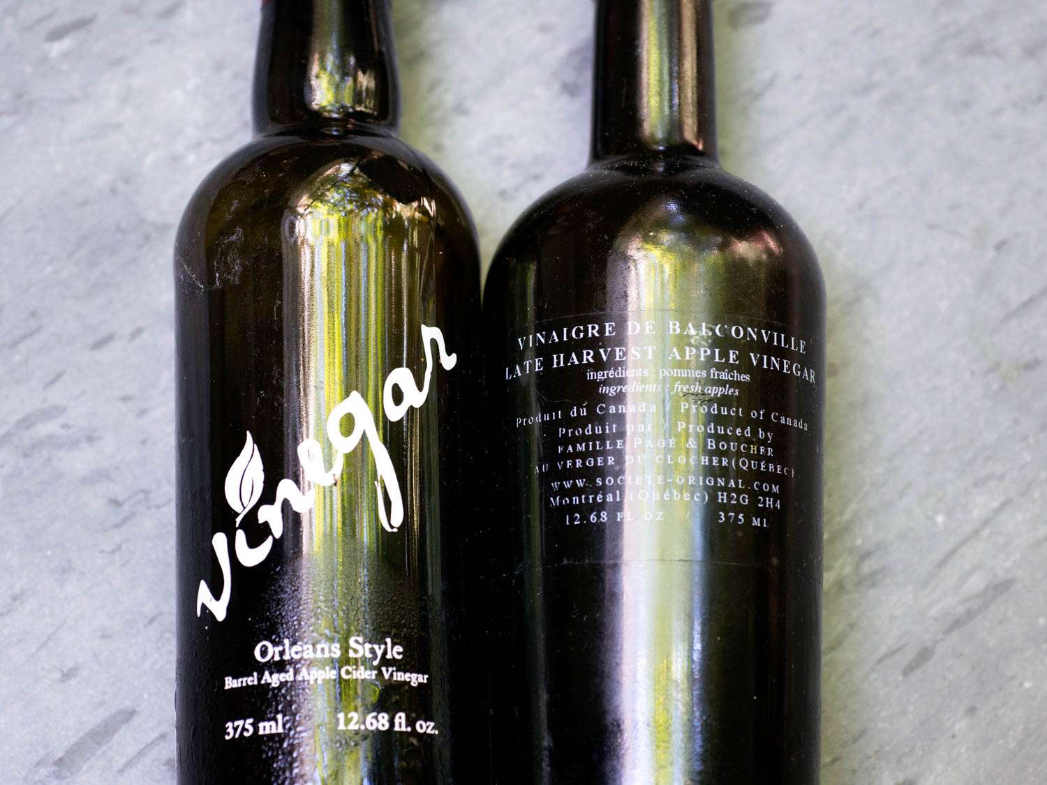 Closeup of the label of a bottle of "Orleans style" apple cider vinegar.