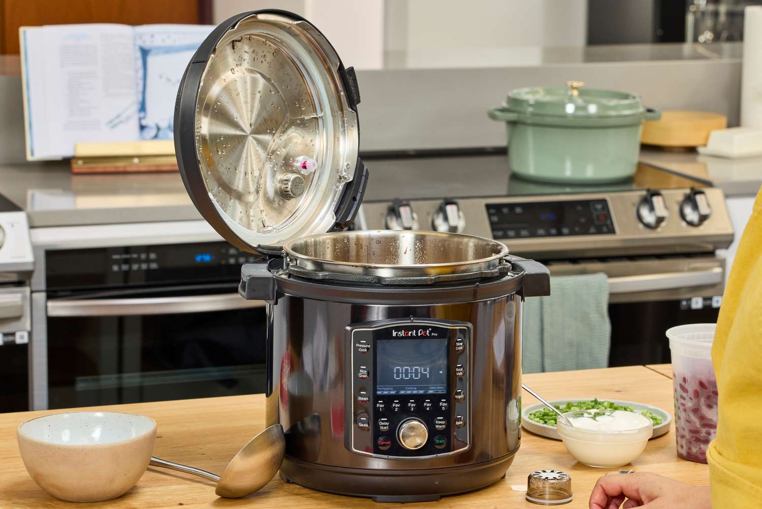 An Instant Pot Pro 10-in-1 6-Quart Pressure Cooker with the lid open