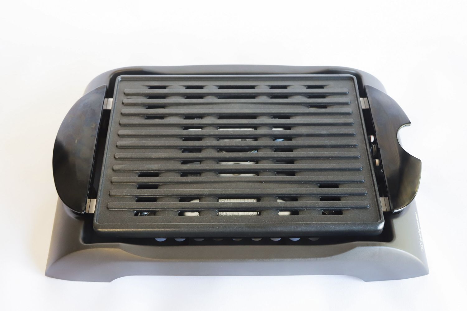 The Zojirushi indoor grill on a white surface