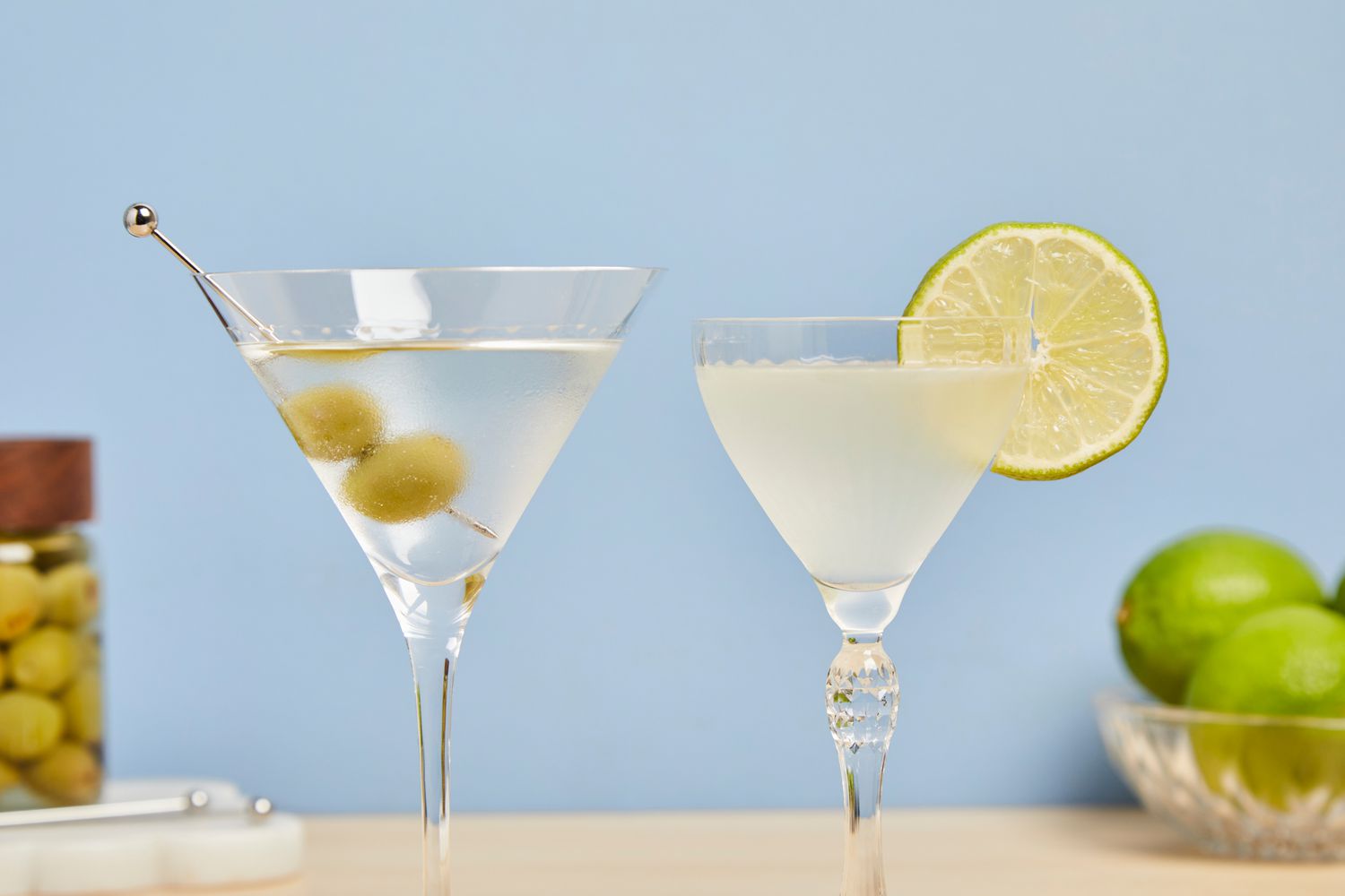 two martini glasses, one with a martini and the other with a daiquiri