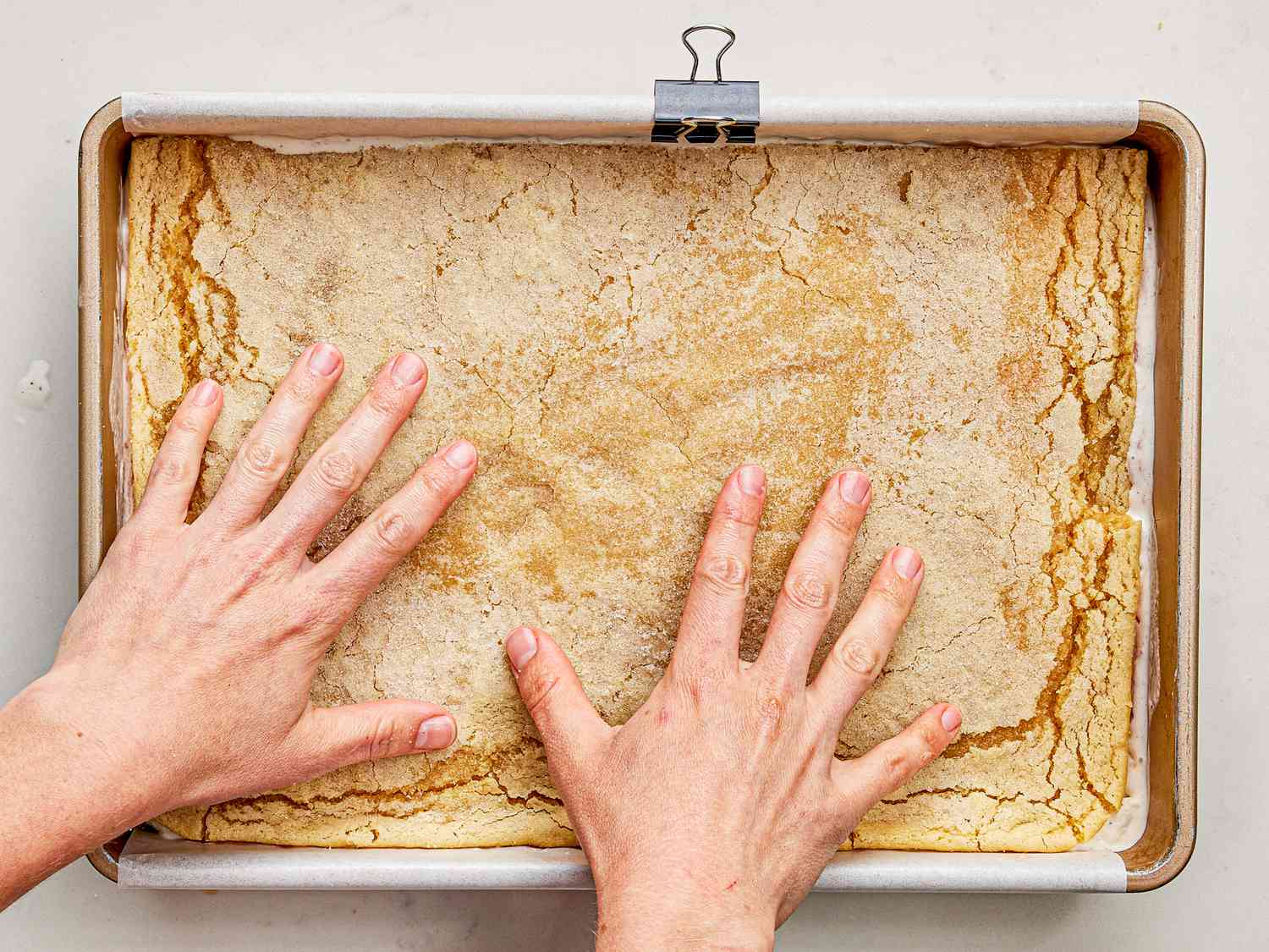 Overhead view of assembling cookie sandwich