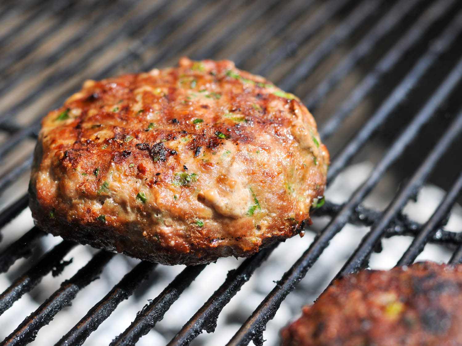 Turkey burger on the grill.