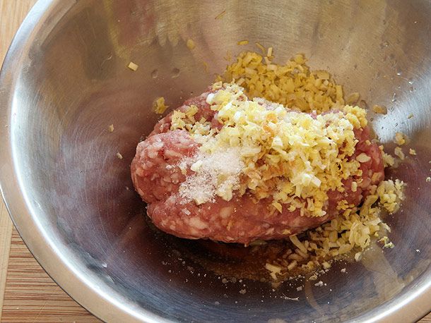 Filling for wonton in a mixing bowl. 