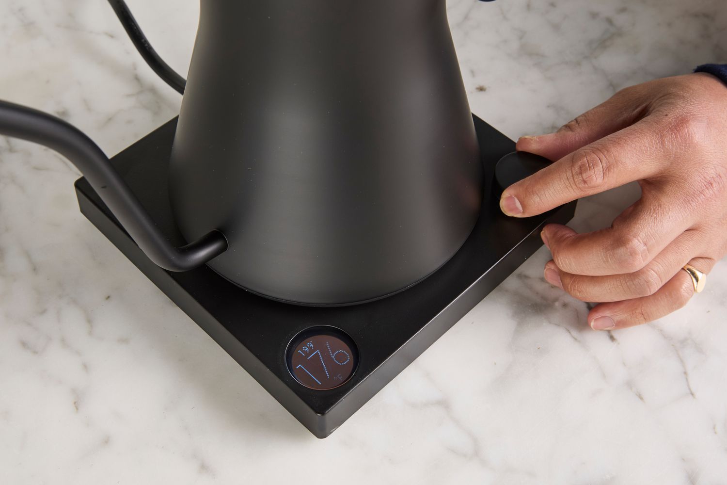 Person touching Fellow Stagg EKG Electric Gooseneck Kettle