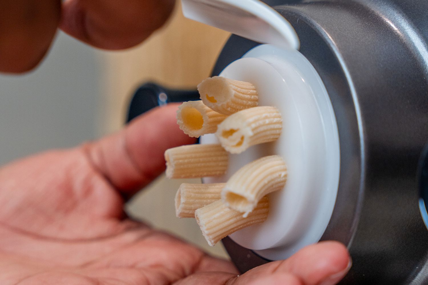 person making pasta Philips Artisan Smart Pasta Maker