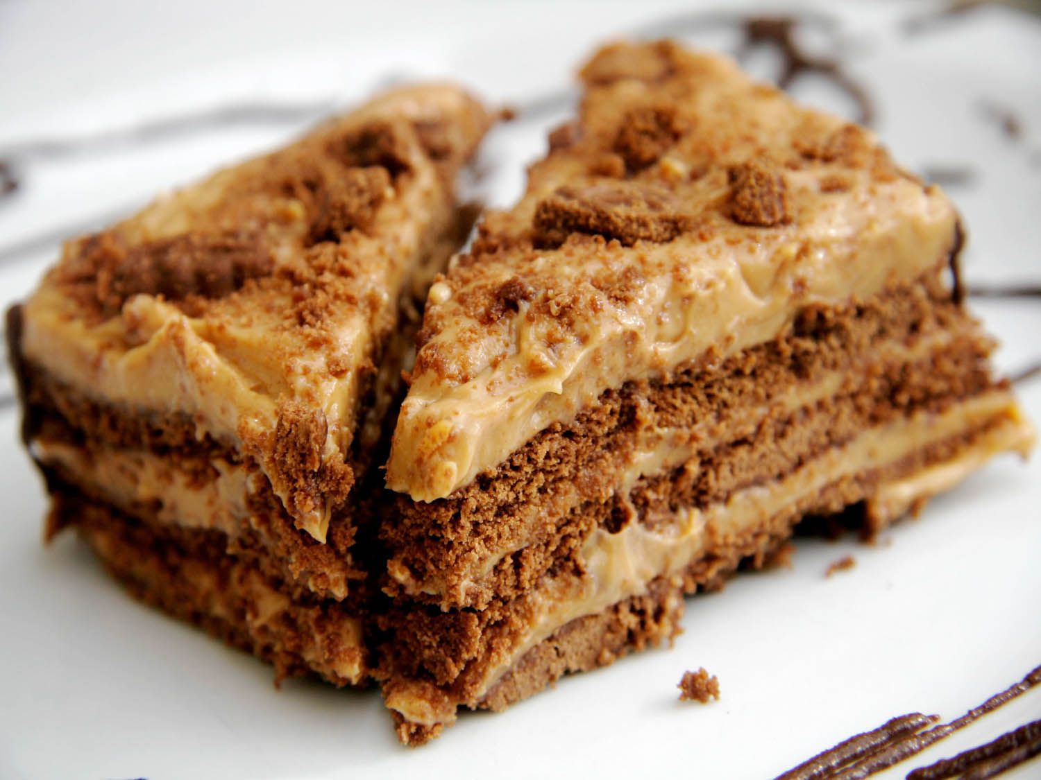 A piece of Argentinian chocotorta, cut into two triangles.