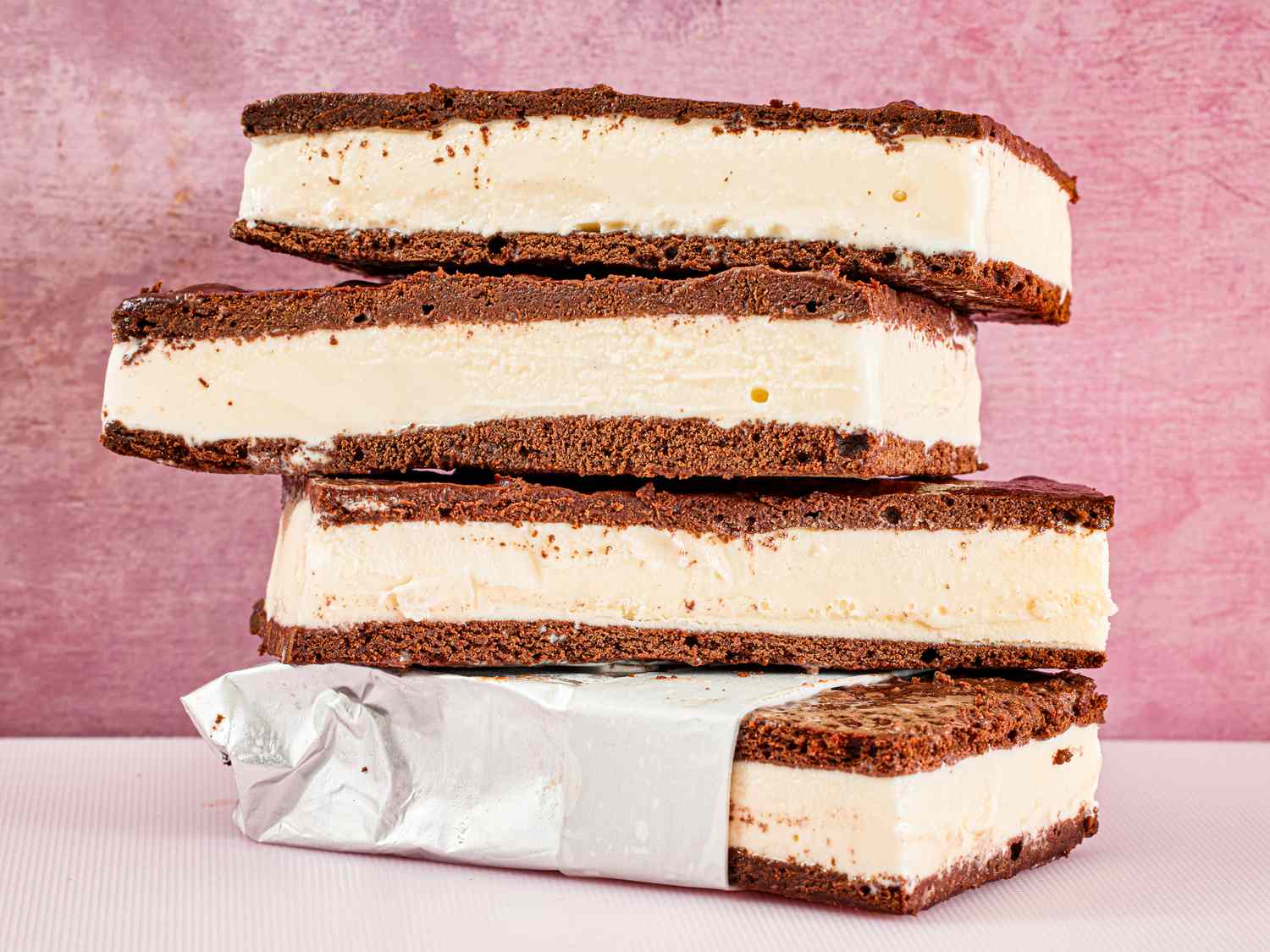 Side view of stack of vanilla ice cream sandwiches 