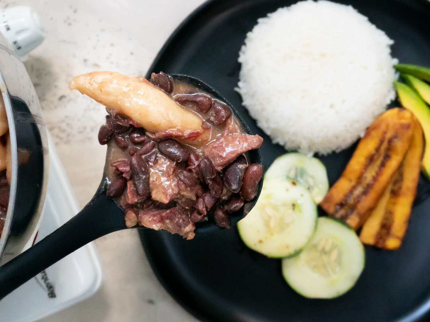 Overhead view of a bite of stew peas