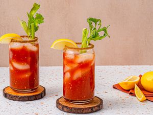 Two bloody marys one wooden costers