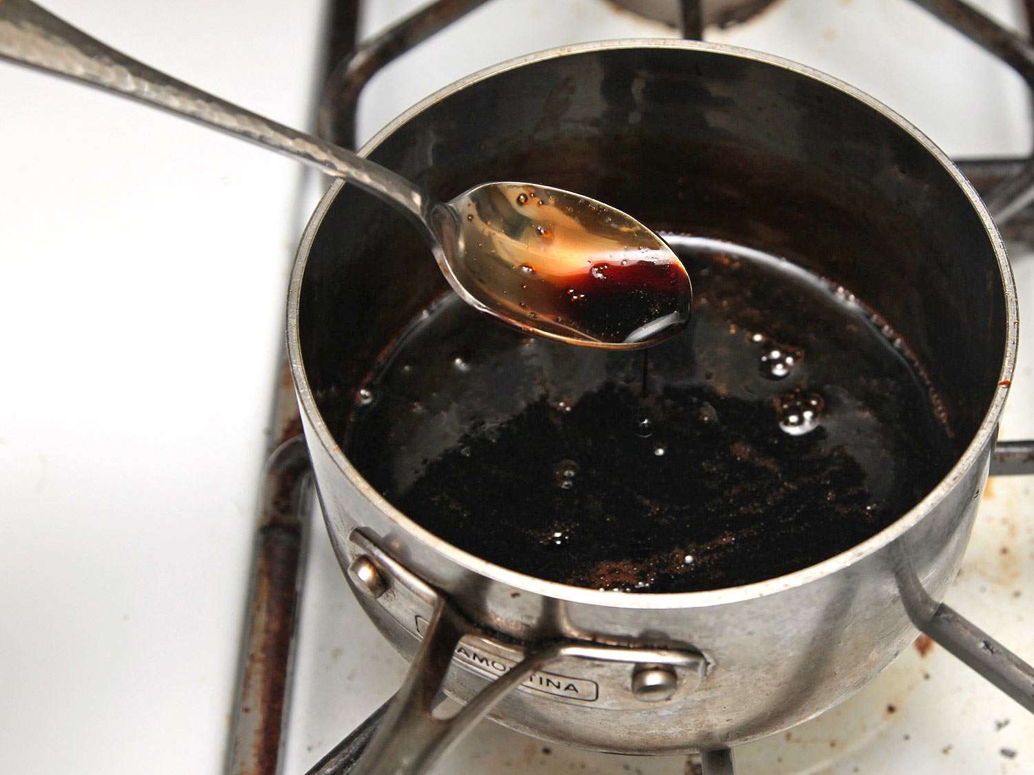 A saucepan of balsamic glaze for ham. 