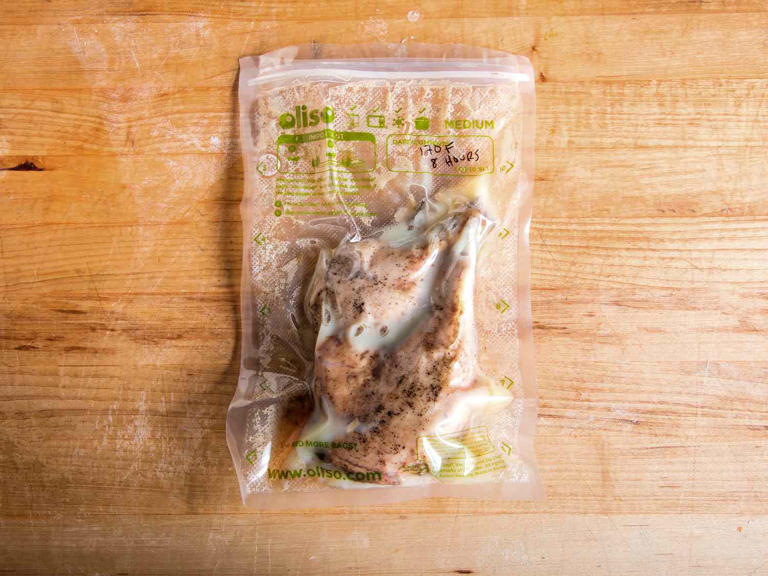 Duck legs sealed in a vacuum bag and cooked sous vide.