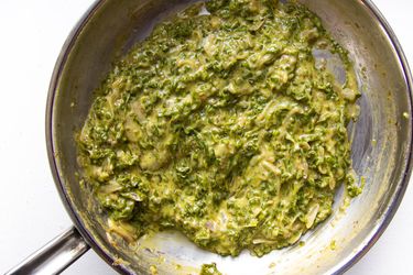 Overhead of pan filled with creamed shishito pepper sauce.