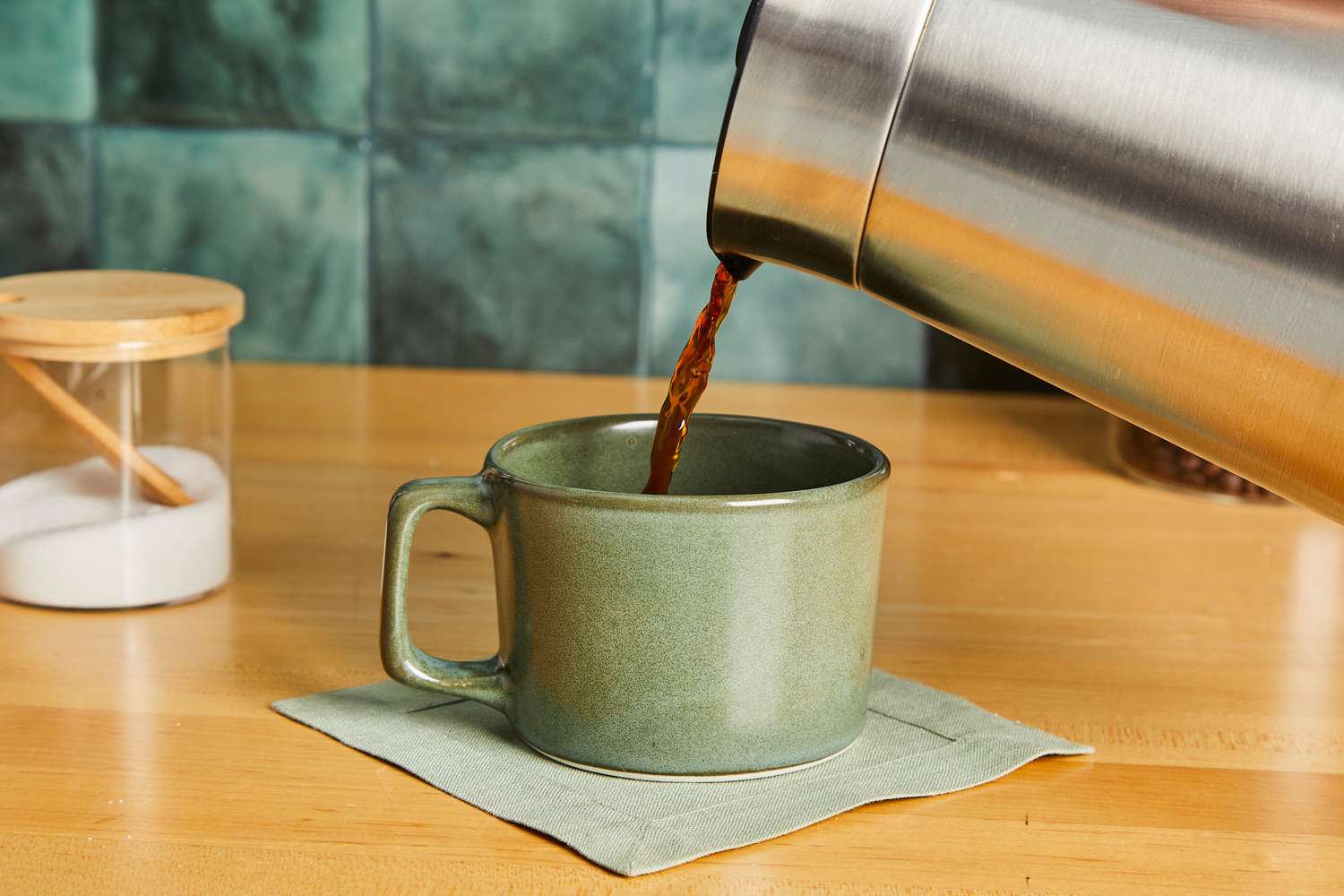 Pouring coffee into the Haand short mug