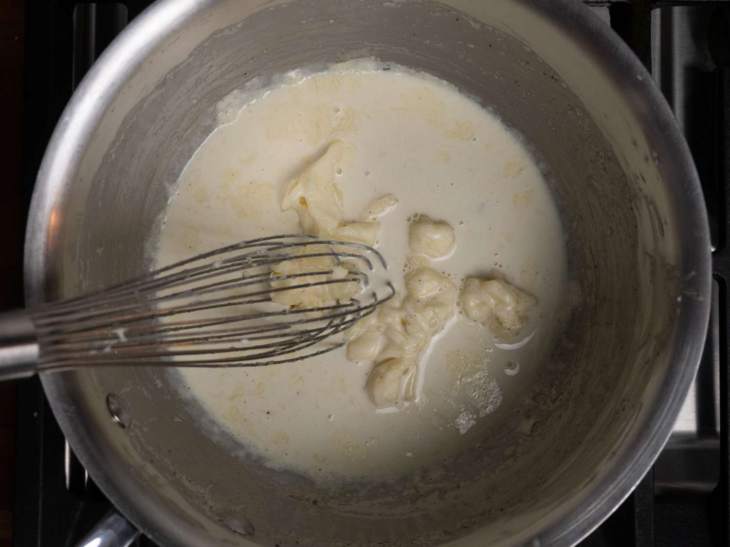 Chunks of Taleggio are slowly melted and whisked into the cream sauce.