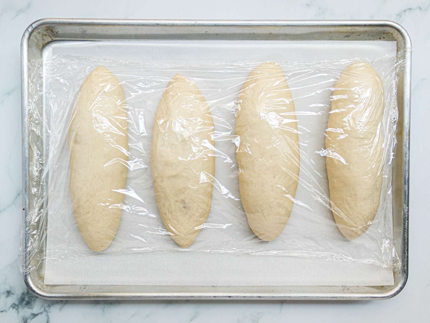 Overhead view of hoagie rolls expanded