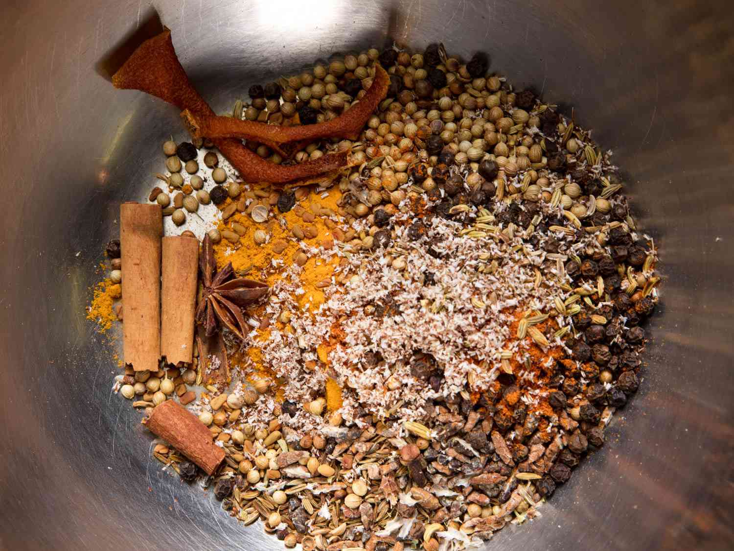 Spices for Japanese curry in a spice grinder before grinding.