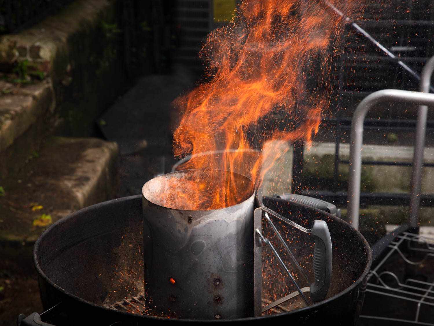 A fiery chimney starter.