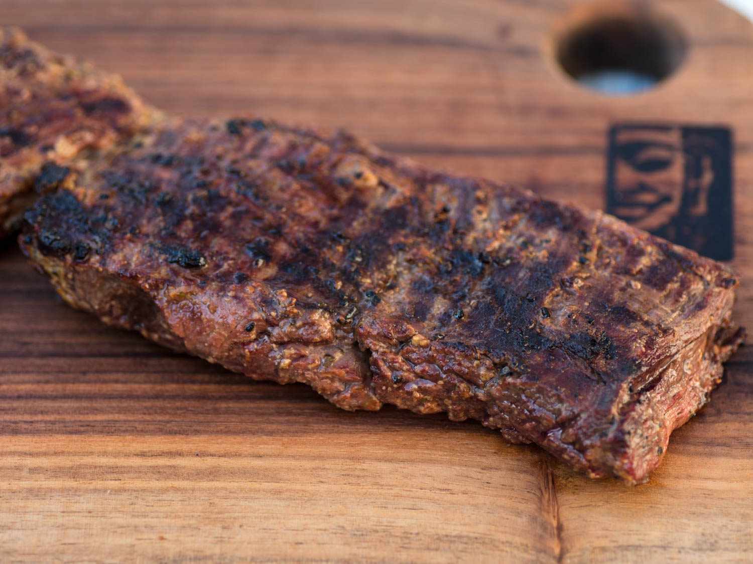The finished steak resting on a cutting board, ready to slice and serve.