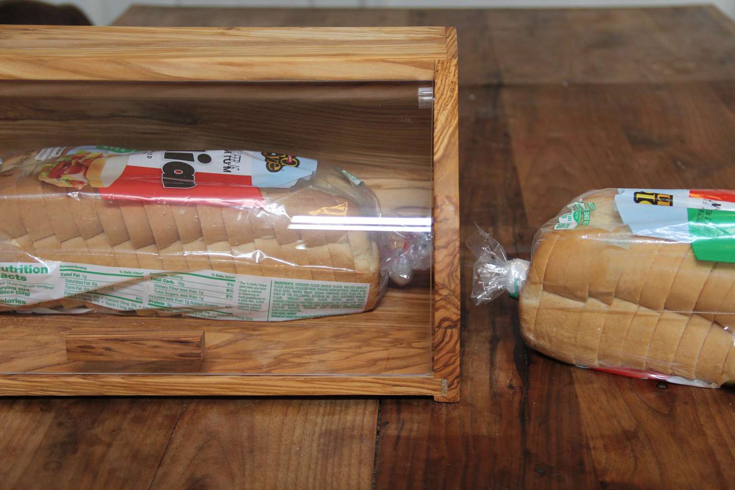Sliced sandwich bread in a bread box.