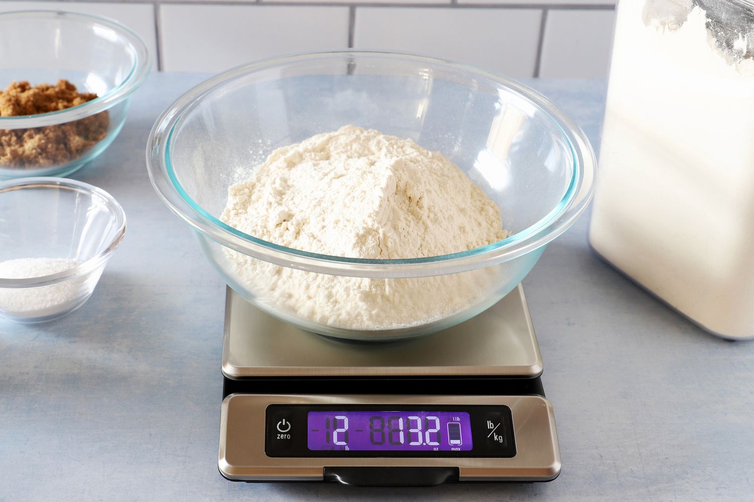 A bowl of flour on a digital scale