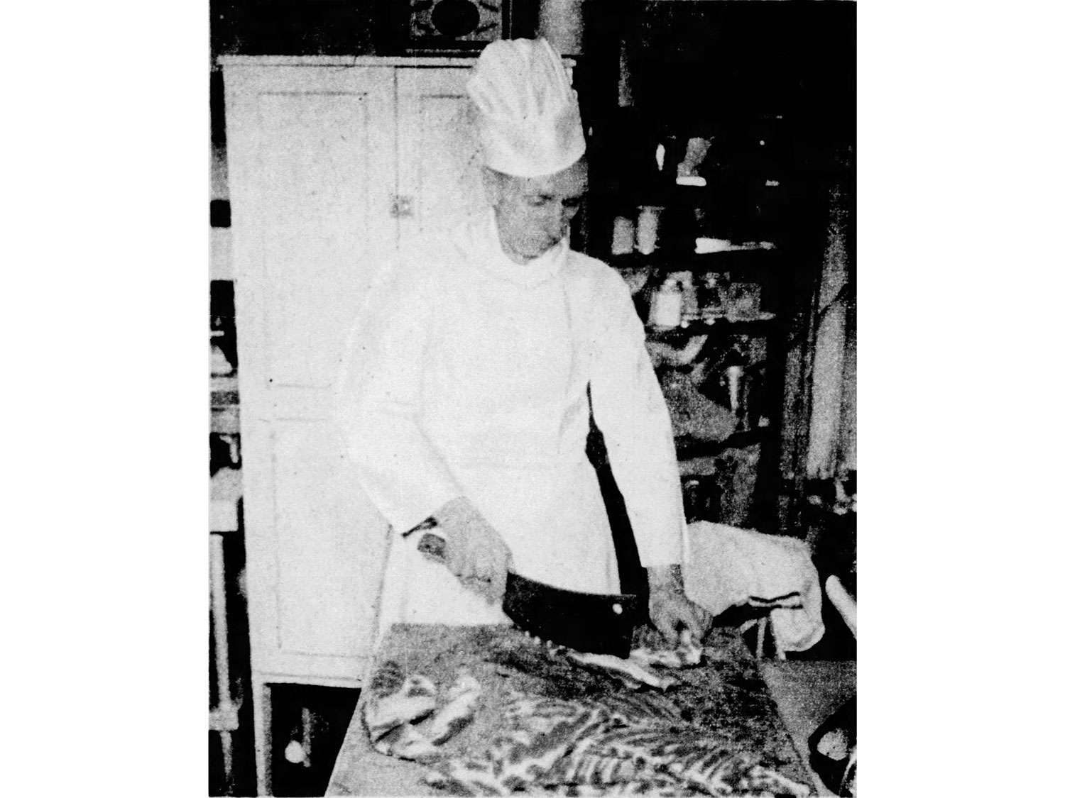 Roscoe Duncan prepares St. Louis-style ribs.
