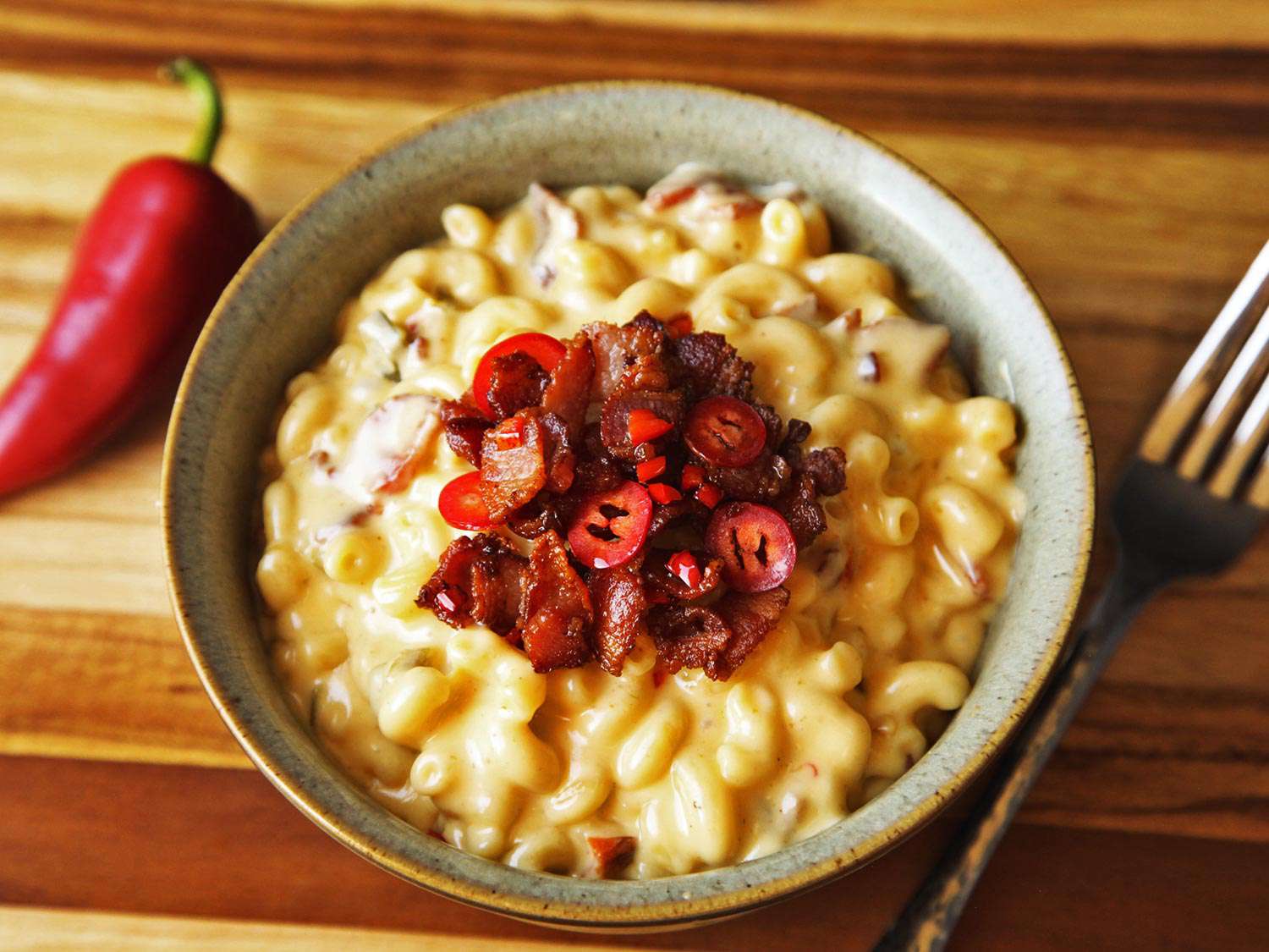 Overhead view of a bowl of bacon-jalapeño mac and cheese.