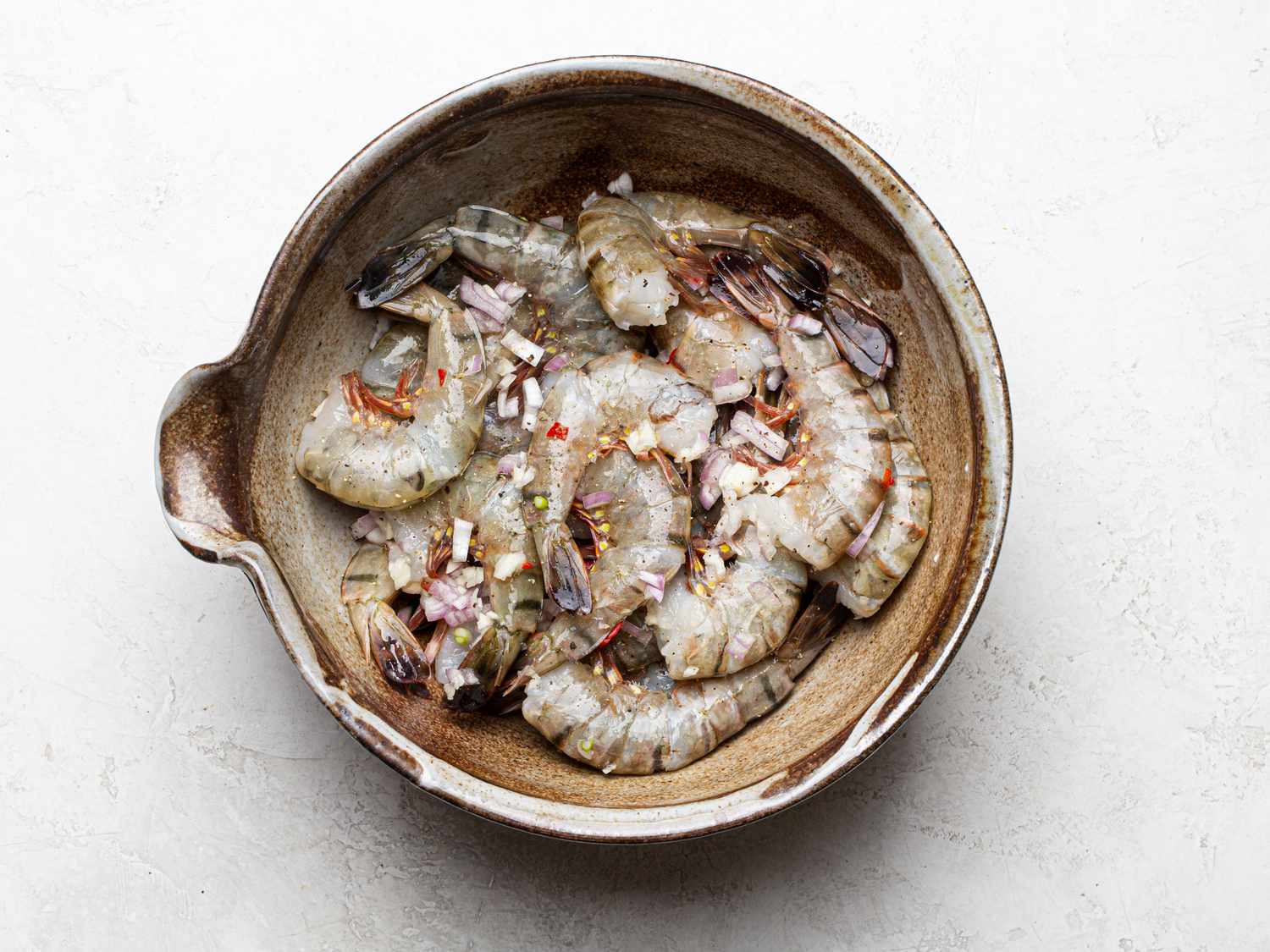 Overhead view of shrimp marinating 