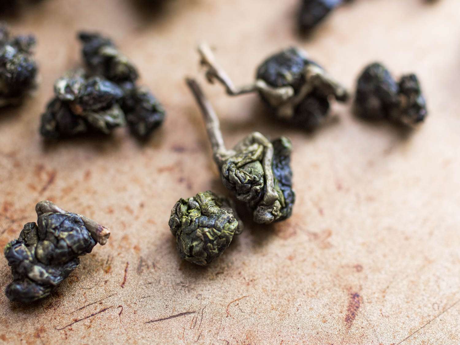 A closeup of dried oolong tea leaves