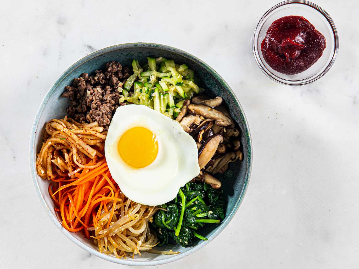 Overhead view of finished bibimbap bowl