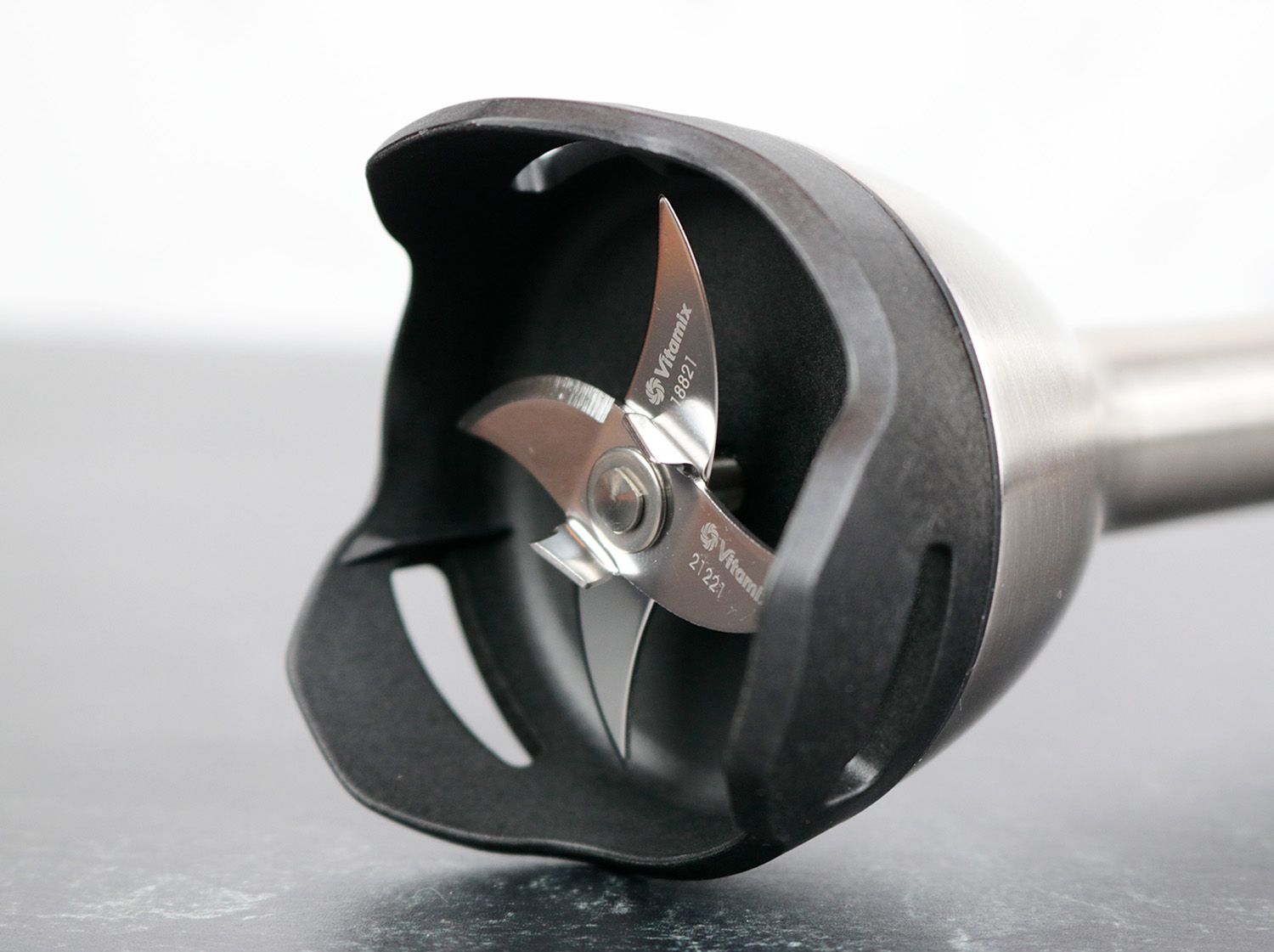 the X shaped blade and plastic blade guard of the Vitamix immersion blender