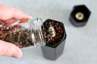 Filling the Hexmill with peppercorns