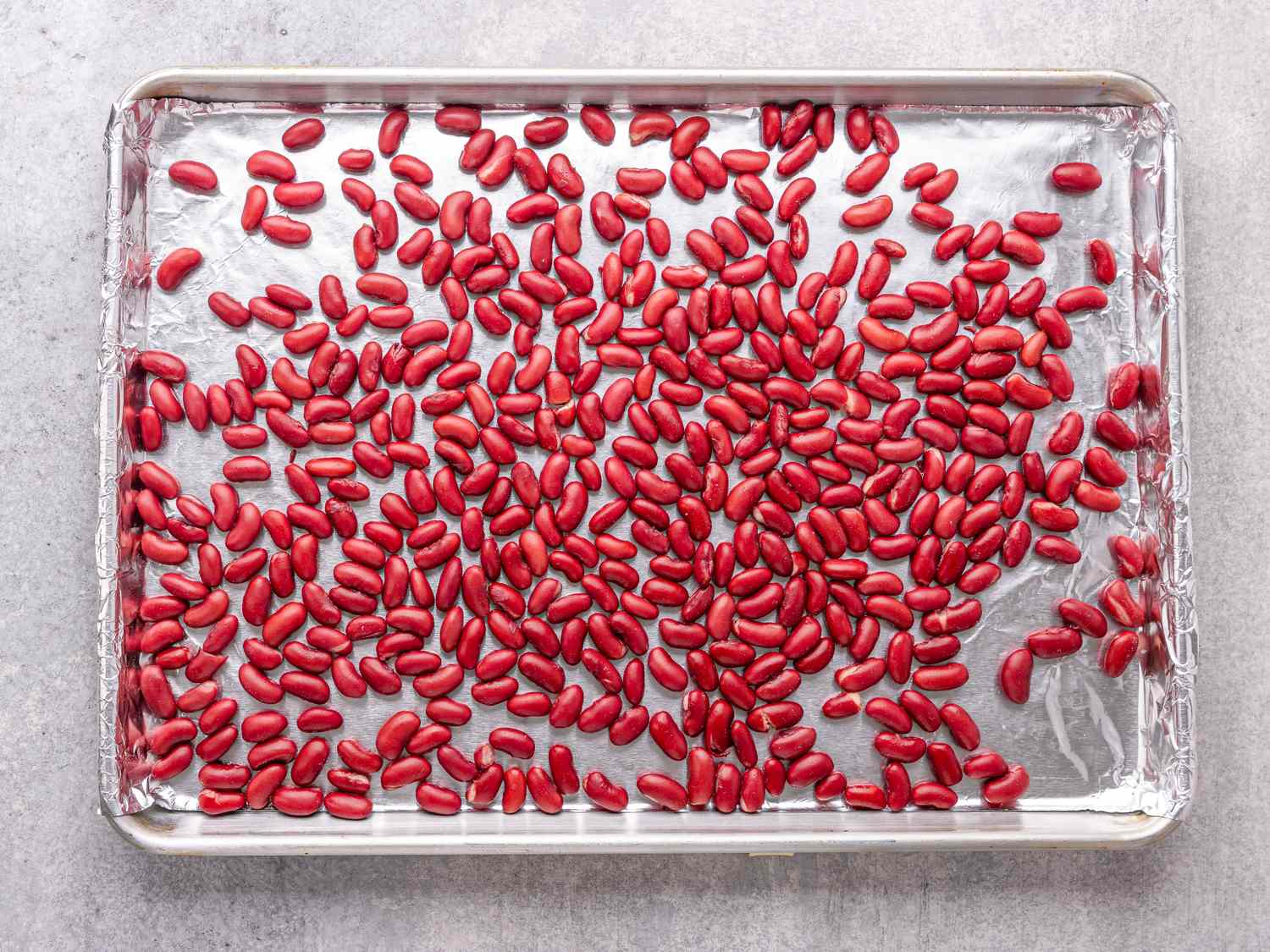 Tray with red kidney beans spread across
