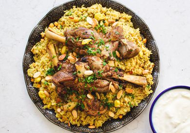 Overhead view of Qidreh with a side plate of yogurt