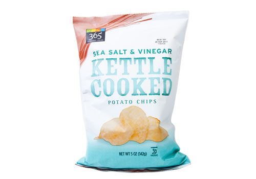 A bag of Whole Foods 365 brand sea salt and vinegar kettle cooked potato chips. 