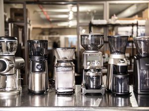 Testing coffee grinders at Joe Pro coffee shop