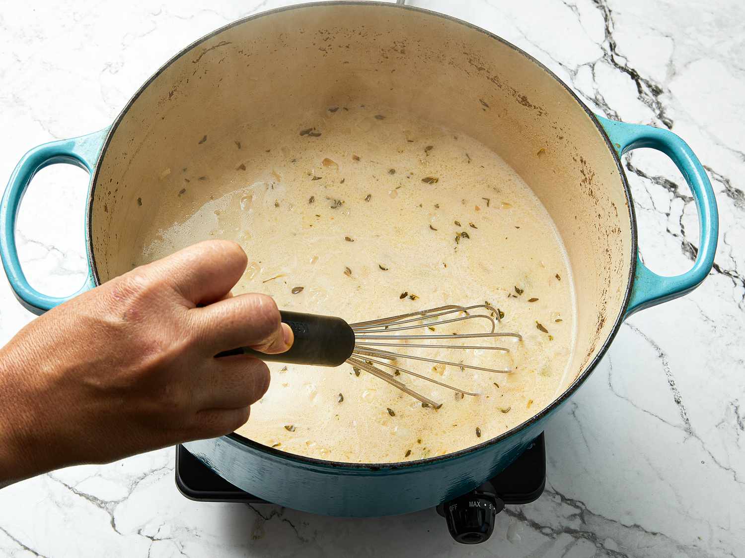 Soup with chicken stock, milk, salt and Worcestershire whisked together and thickened