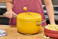 A person holds the handle on the Popsmith The Popper