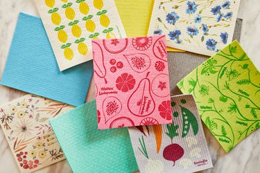 several swedish dish cloths on a marble surface