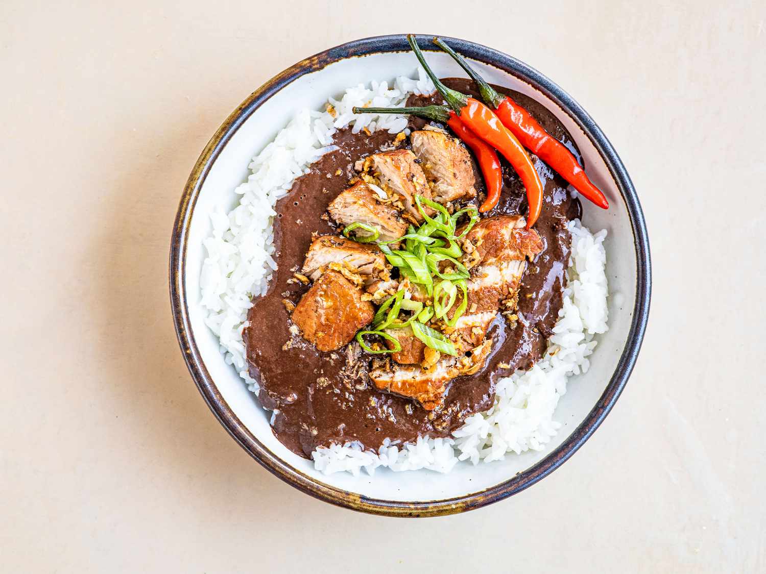 Dinuguan served over rice