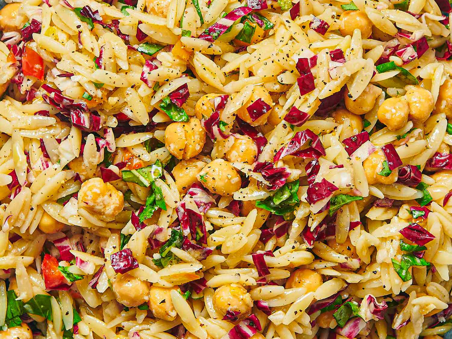 Orzo pasta salad with vegetables and chickpeas