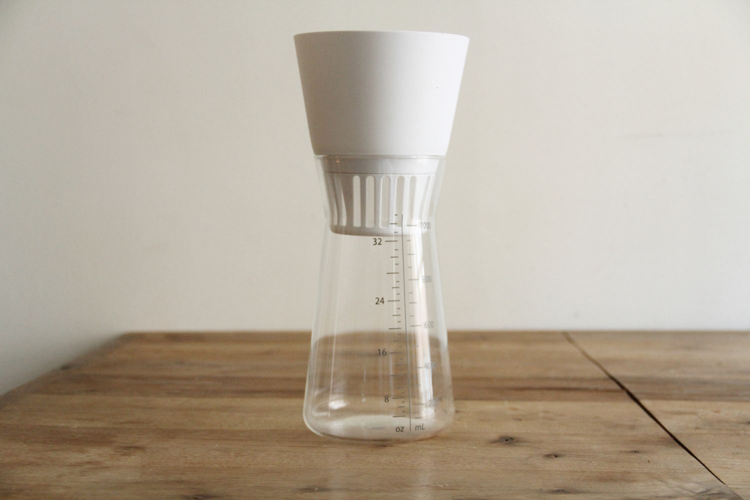 chef'n nut milk maker on a wooden table