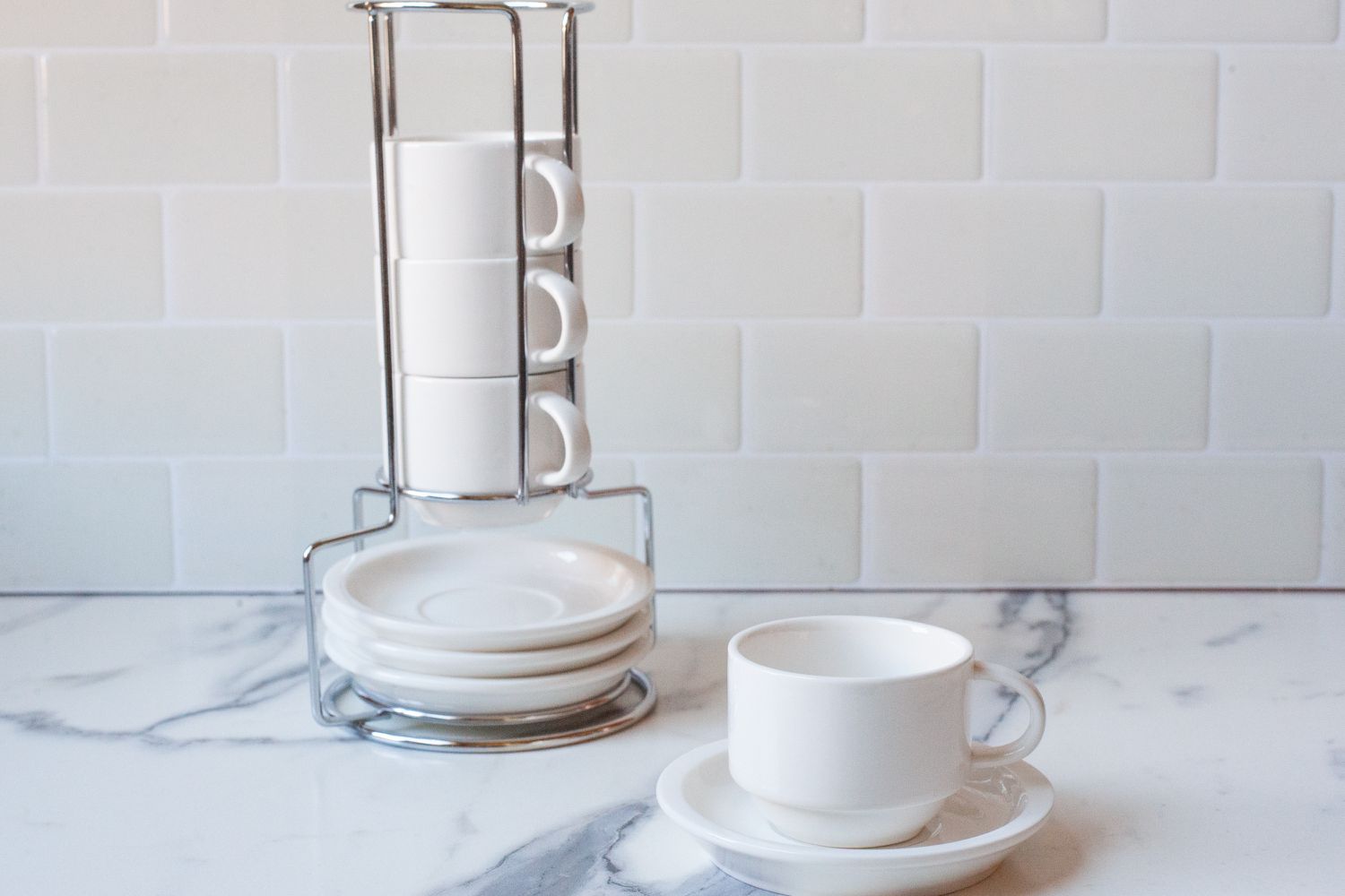 Sweese Porcelain Stackable Espresso Cups on a marble counter top 