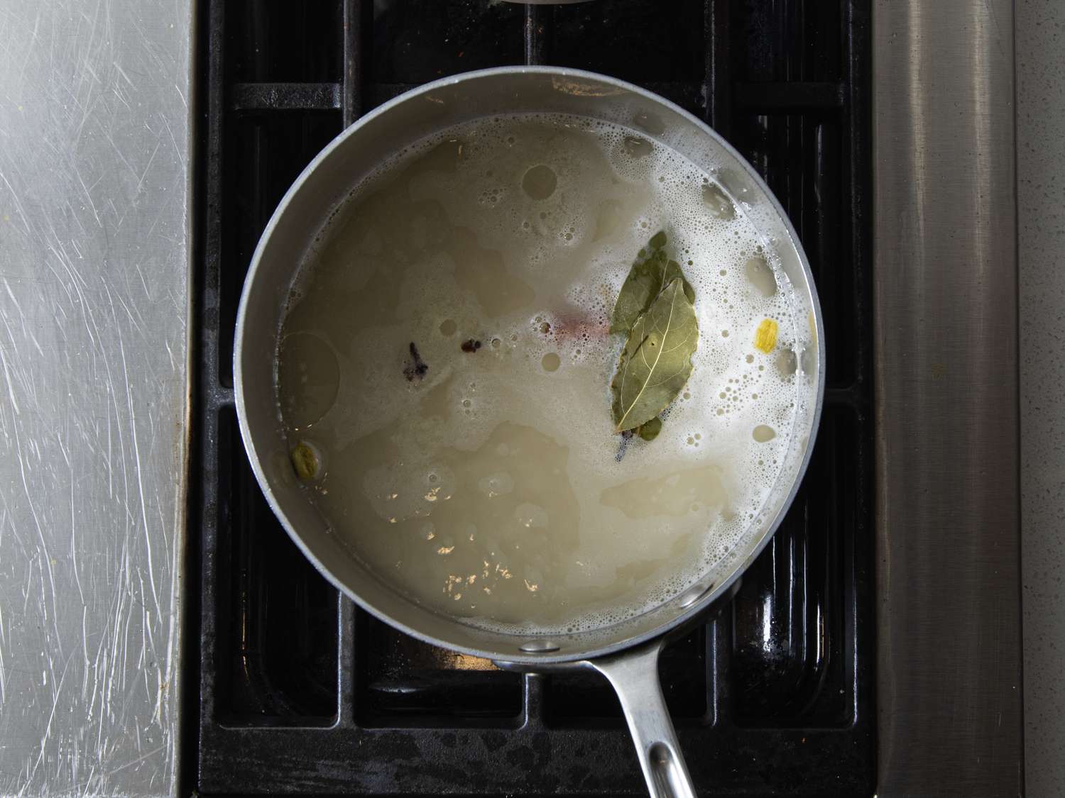 Rice being boiled with spices