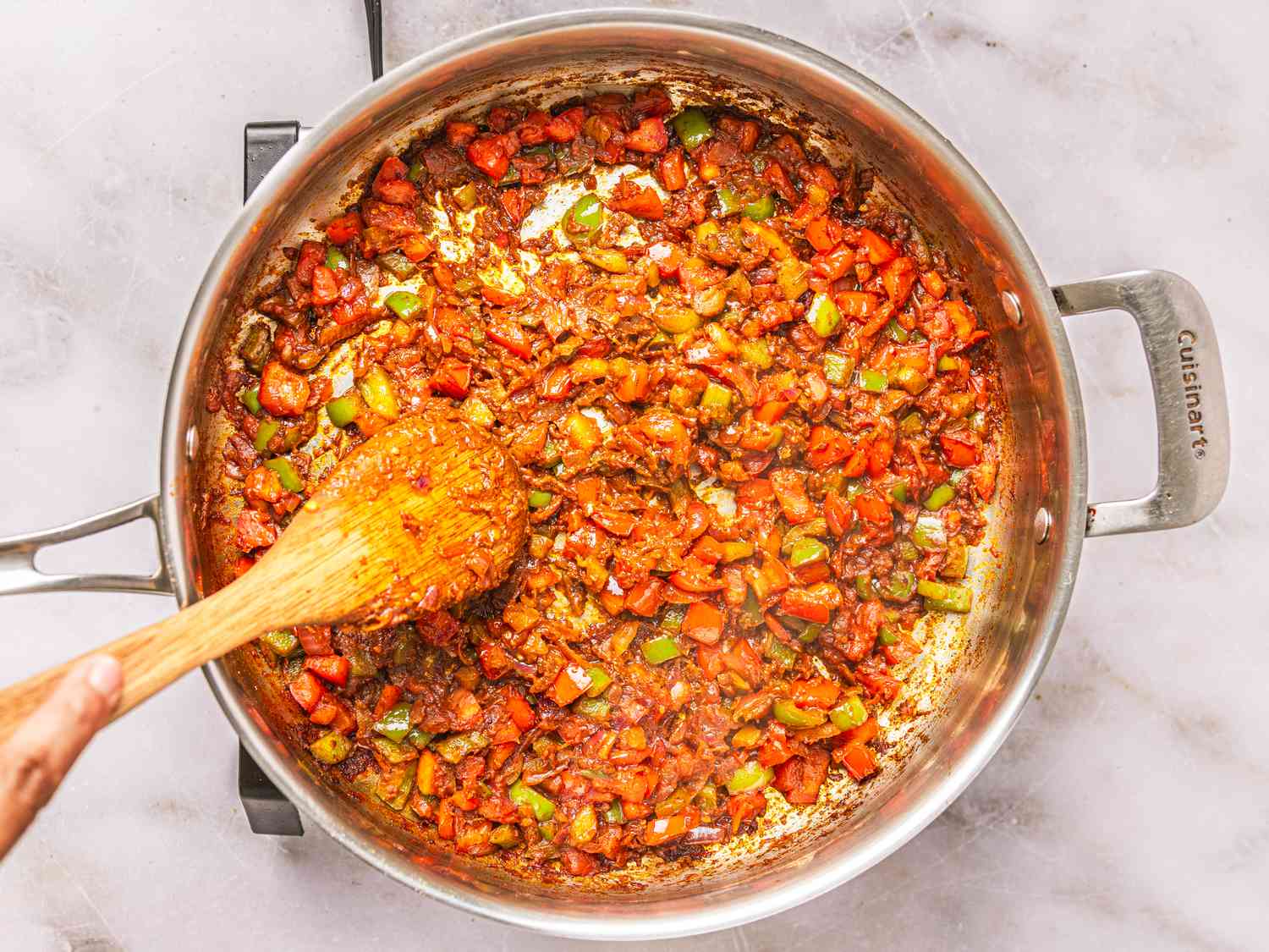Overhead view of sauce thickening 