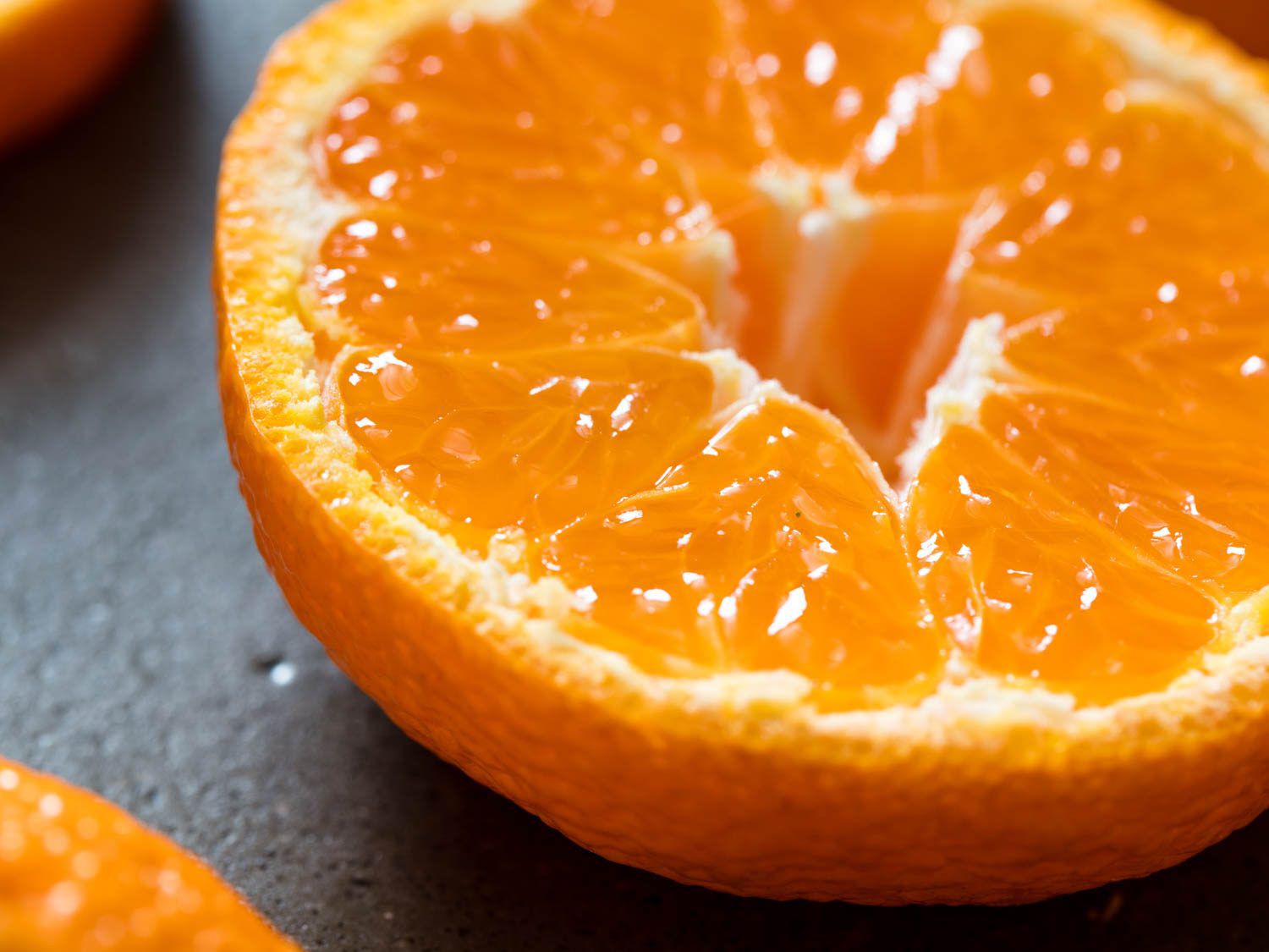 A close up of a halved orange.