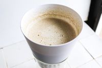 nut milk straining into the chefn