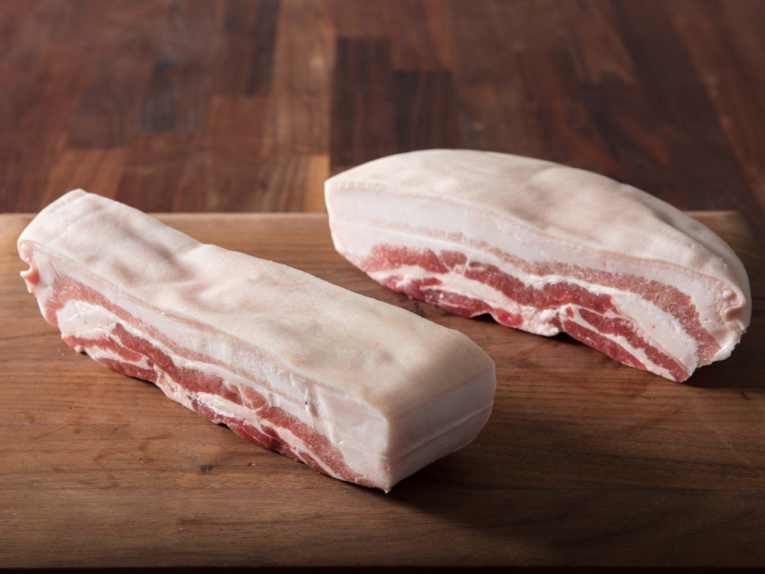 Two pieces of fatty pork belly
